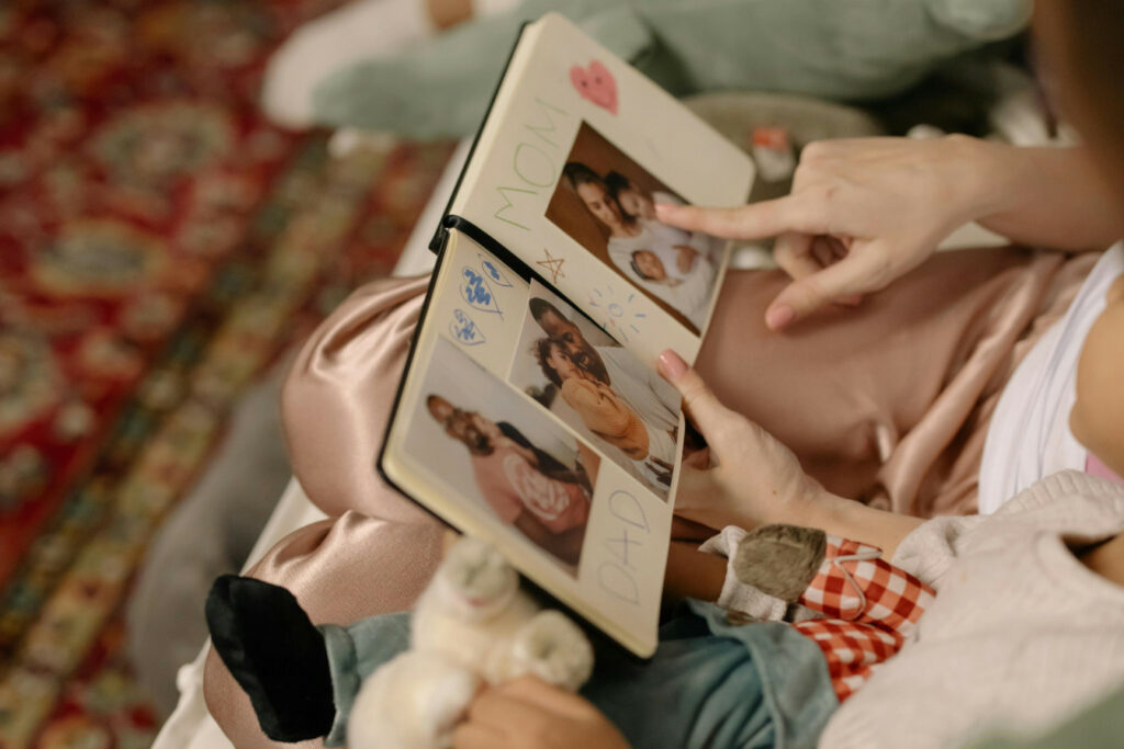 family viewing a photo album